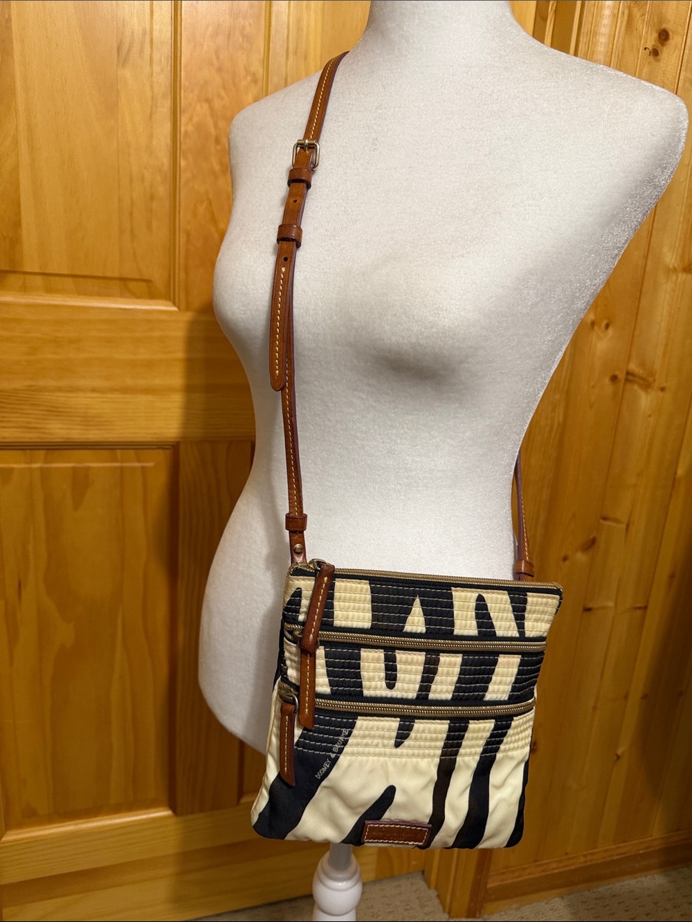 Dooney & Bourke Leather-Trim Zebra Print Crossbody Bag. 3 pockets.